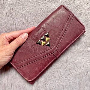 Volcom Burgundy wallett. Brand new, never used.